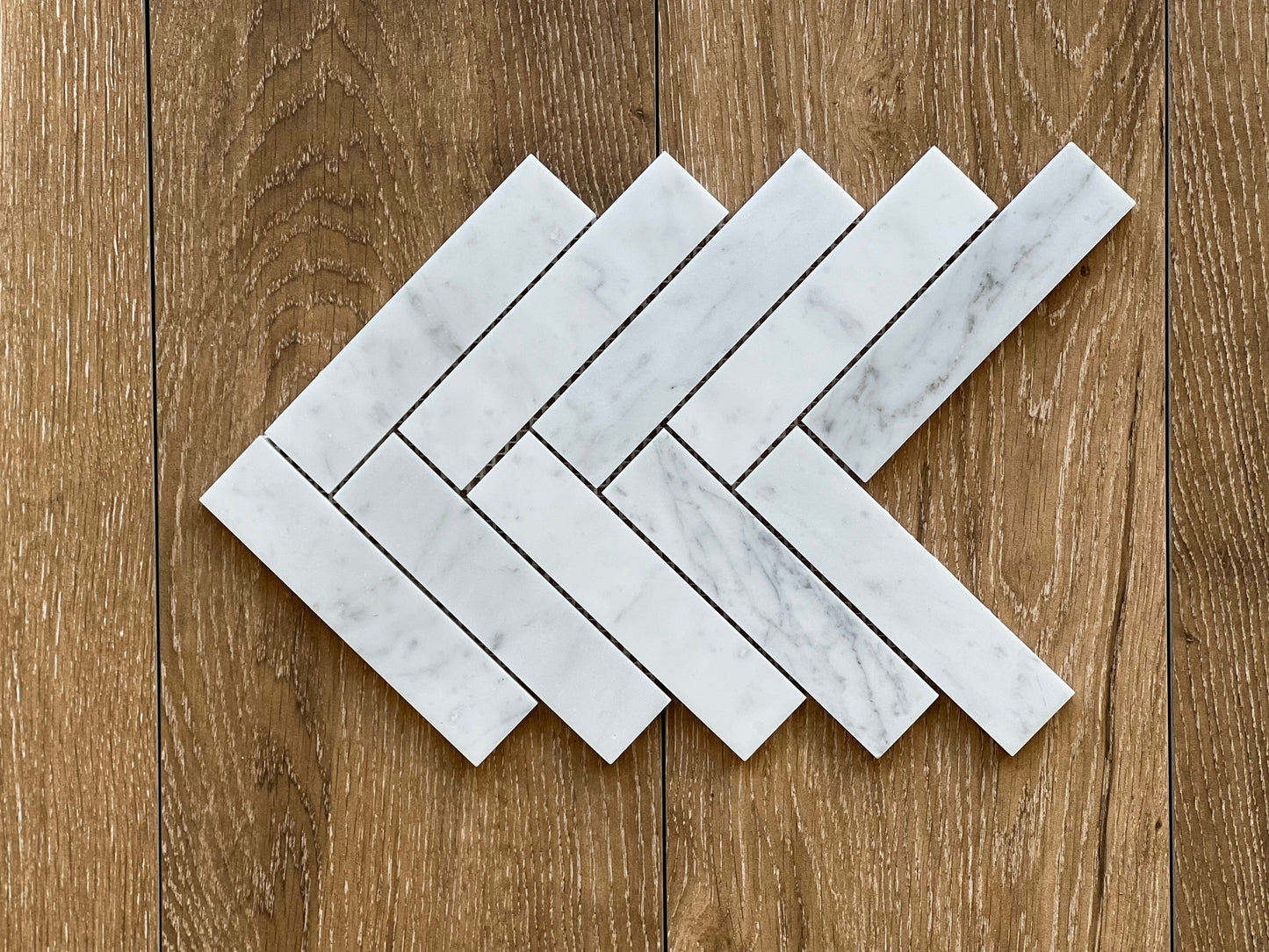 215X263 CARRARA HERRINGBONE HONED