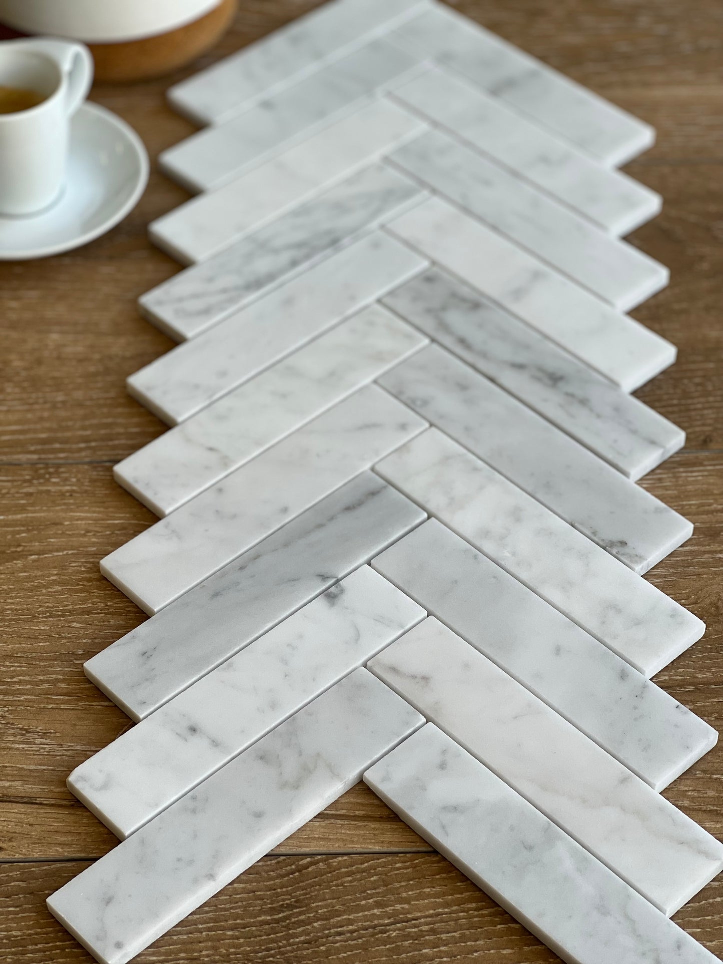 215X263 CARRARA HERRINGBONE HONED